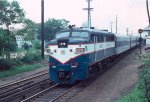 LI 613 heads west on opposite main Montauk train